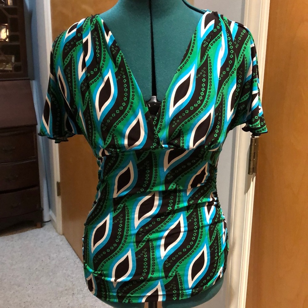 Patterned blue and green short sleeved top.